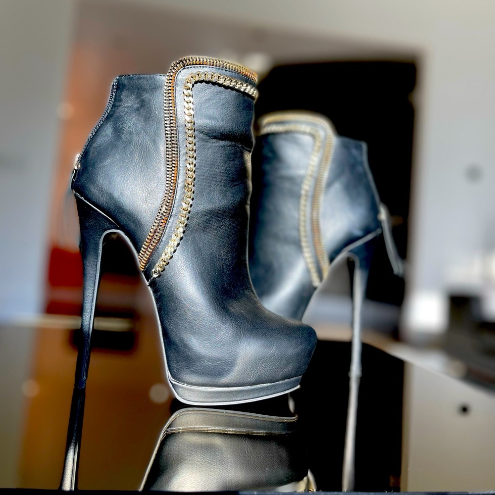 Bebe black booties, leather boots and gold chain , high heel, 7